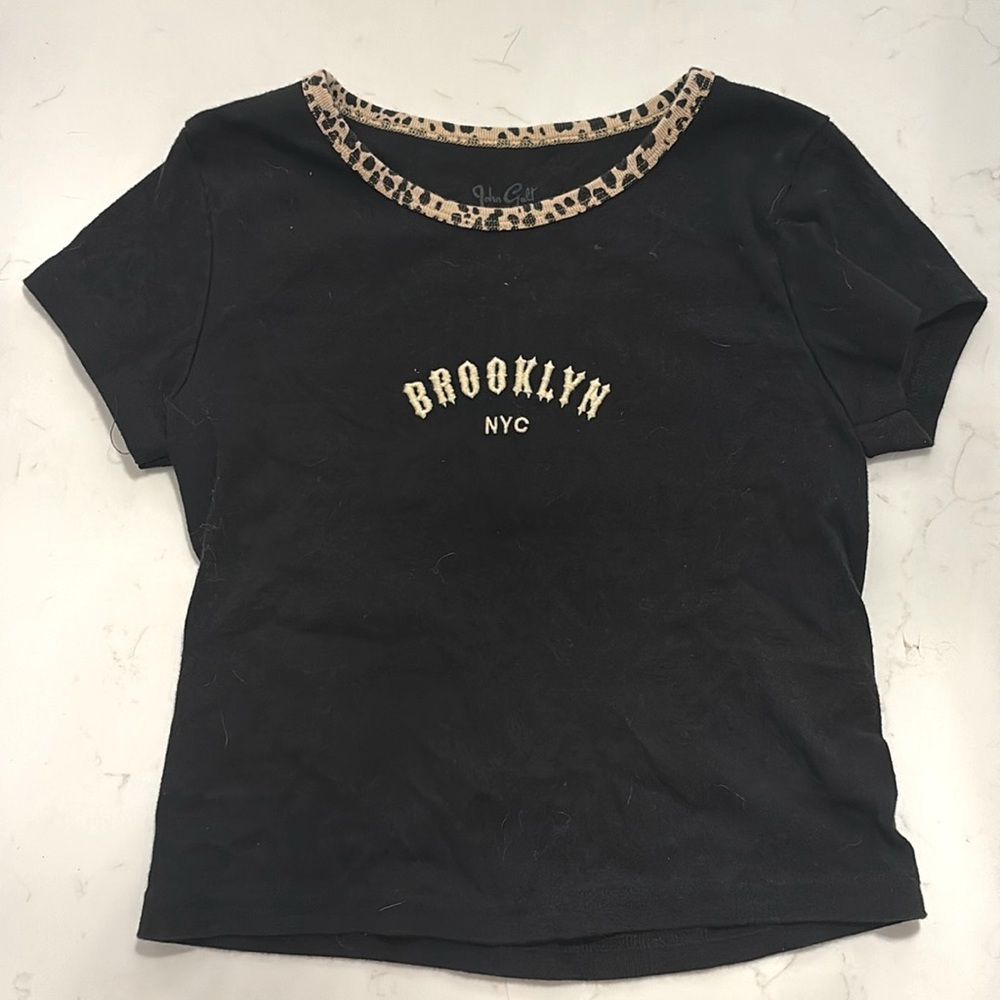 Brandy Melville— black cheetah trim Brooklyn NYC short sleeve